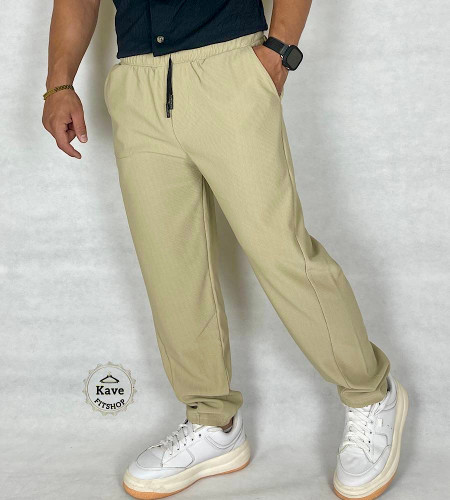 شلوار مردانه مدل کلاسیک کبریتی | کرم استخوانی نمای چپ